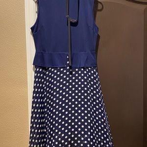 Flare dress with white poke-a-dots.